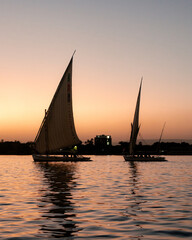 Sunset sailing boat