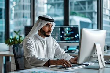 Arab project manager using computer in office with Augmented Reality social media icons on employees laptops. Concept Augmented Reality, Office Environment, Arab Professional, Technology