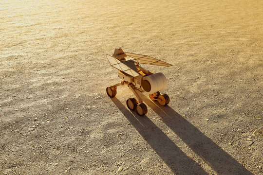 Dawn of Discovery: Mars Rover Investigating Martian Terrain at Sunrise