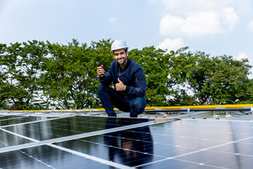 Engineer service check installation solar cell on the roof of factory. Engineers walking on roof inspect and check solar cell panel. Engineer working inspection installation solar cell on the roof