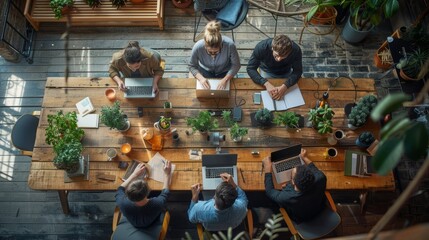 Team collaboratively working around a modern office table. Capturing the essence of teamwork in modern office settings