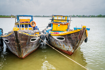 Fototapeta na wymiar Fishing boats on Thu Bon River