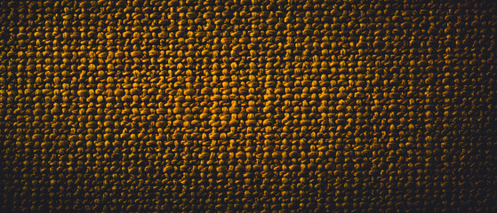 Grungy fabric texture yellow color abstract background