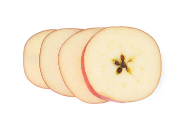 Slices of ripe red apple isolated on white, top view