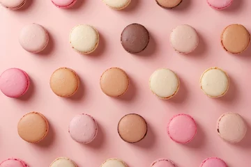 Tuinposter assortment of colorful french macarons on pink background © Klay