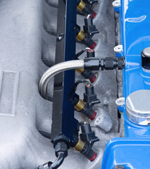 fuel injectors on a petrol car engine
