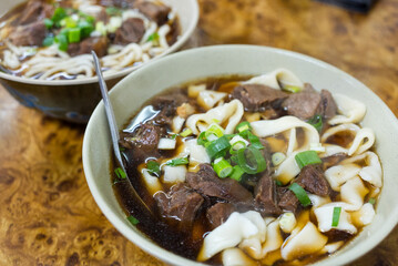 Spicy red soup beef noodle in a bowl
