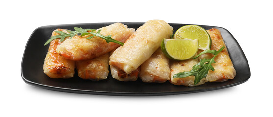 Tasty fried spring rolls, arugula and lime isolated on white