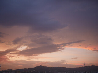Pastel-colored sunset over the mountain of Barcelona