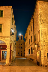 Amazing night view with the beautiful medieval architecture of the old town of Shibenik on the coast of the Adriatic Sea, Croatia. - 767234441