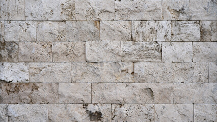 Gray grey beige natural stone concrete cement masonry stonework wall or floor texture stained...