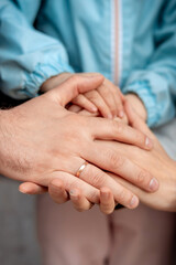 Close-up of the hands of mom, dad and child.Family concept.
