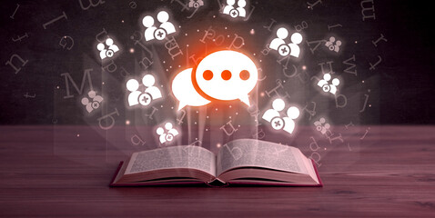 Open book with social networking icons above - 767242836