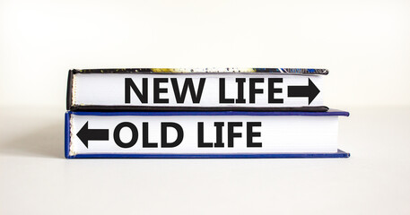 New or old life symbol. Concept word New life Old life on beautiful books. Beautiful white table white background. Business and new or old life concept. Copy space.