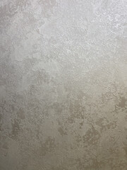 Textured colored plaster, can be used for the background. It has a pronounced structure