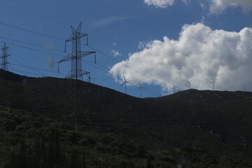 Obraz premium Powerful Structures: Electric Towers on the Horizon