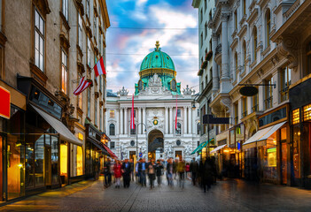 The pedestrian zone Herrengasse with a view towards imperial Hofburg palace in Vienna, Austria. ...