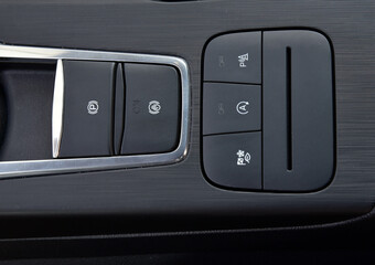 Close-up of black buttons on car panel - 767268620