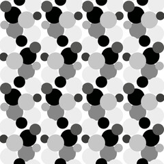 Seamless vector pattern with black and white polka dots in an unusual patterned interpretation