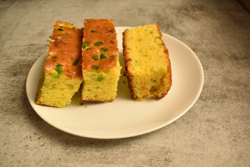 Closeup picture of a tasty fruit cake with colorful plum