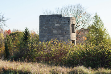 An old abandoned silo from a farm. Broken down and only a small part remains standing. © MB Design & Photo