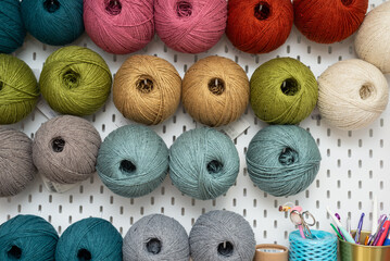 Close-up of a store display with ball of wool.  - obrazy, fototapety, plakaty