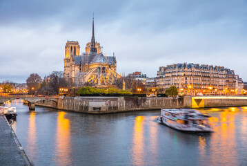 Notre Dame Cathedral in Paris in the evening