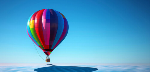 A colorful hot air balloon drifting lazily across a clear blue sky, casting a shadow below. [Blank Label]