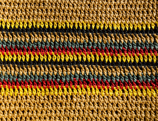 Crochet close-up. Handmade knitted raffia jewelry.