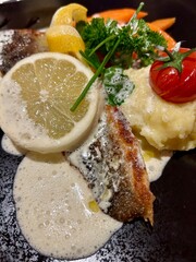 Sea bass with mashed potatoes and carrots