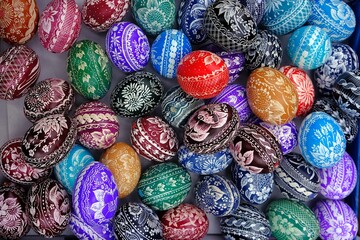 Beautiful handmade colorful Easter eggs in a basket. Kurpie, Poland