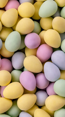 Decor in the form of colorful eggs. chocolate eggs for decoration. vertical background