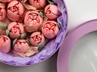 handmade dessert  pink marshmallows in the form of flowers in a round box 