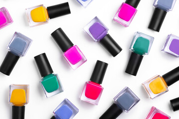 Pattern background of bottles colorful nail polish, top view