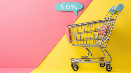 Empty shopping cart on pink and yellow background fifty percent discount - obrazy, fototapety, plakaty