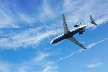 Monterey, CA, USA - March 24, 2024: US Airways Express jet passes overhead - obrazy, fototapety, plakaty