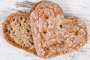 Bread in shape of heart baked from whole grain flour