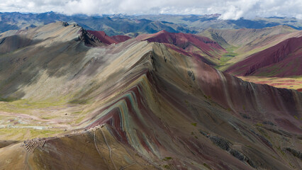 Aerial Drone view of Vinicunca Winikunka Montaña de Siete Colores Rainbow Mountain Andes Mountains...