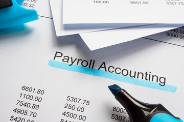 Documents with payroll accounting and marker. - obrazy, fototapety, plakaty