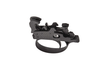 Shock trigger for shotgun isolate on white back. Gun trigger. Repair spare part.