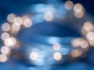 Bokeh, defocused image of burning lights. Abstract Light Background.
