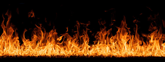 Hell flames, devil's mouth. fire banner. A background of scalding flames. Firestorm. Fire burning. Bright burning flames on a black background. Wall of Real fire, abstract background. Fire flames