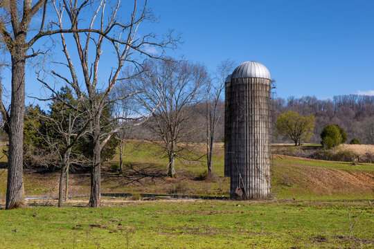 Agricultural field where two silo's tand in rural Virginia, USA
