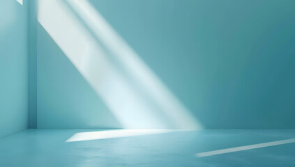 Obraz premium Minimal abstract light blue background for product presentation. Shadow and light from windows on plaster wall.