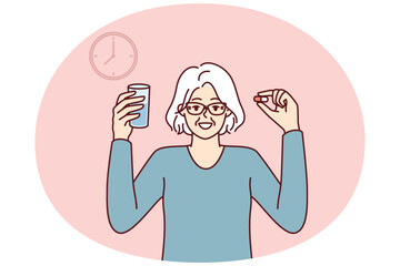 Elderly woman with pill and glass of water stands near clock following doctor prescriptions and recommendations for treatment. Concept of calendar or schedule for taking medications for treatment