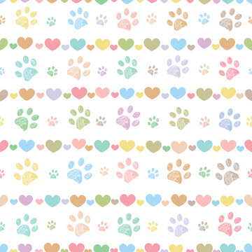 Colorful paw prints seamless fabric design pattern