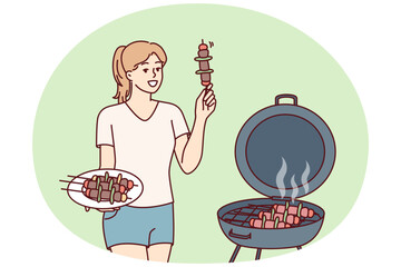 Woman barbecues on outdoor grill in backyard of home preparing for picnic party. Girl fries barbecues meat and BBQ vegetables on hot coals, wanting to get delicious snack with smell of smoke