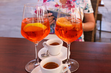 Two espressos and two Aperol Spritz - time to relax in Venice. Italy.
