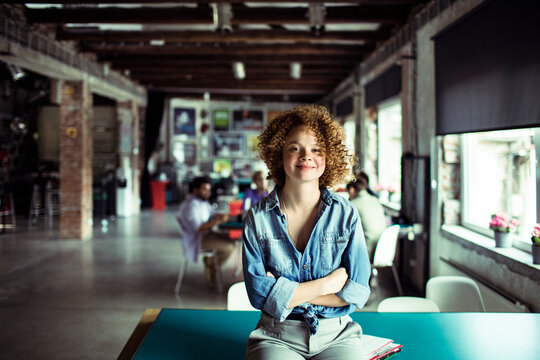 Portrait of a confident young female entrepreneur at a creative workspace