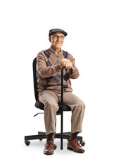 Elderly man sitting in an office chair and leaning on a cane